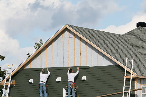 Professional Vinyl Siding technician working in West End, NC